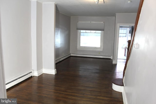 466 N Evans St, Pottstown, PA 19464 - empty room with ornamental molding, a baseboard heating unit, and wood finished floors