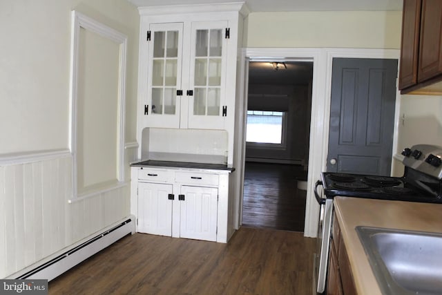 466 N Evans St, Pottstown, PA 19464 - kitchen featuring dark wood-style flooring, stainless steel electric range, glass insert cabinets, baseboard heating, and a baseboard radiator