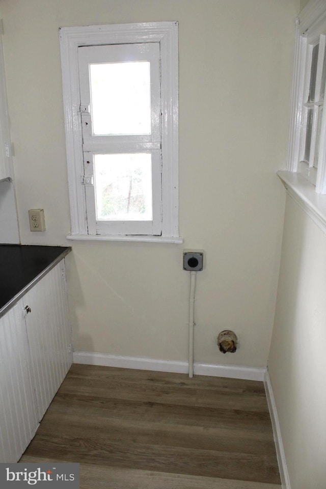 466 N Evans St, Pottstown, PA 19464 - washroom featuring electric dryer hookup, baseboards, wood finished floors, and laundry area