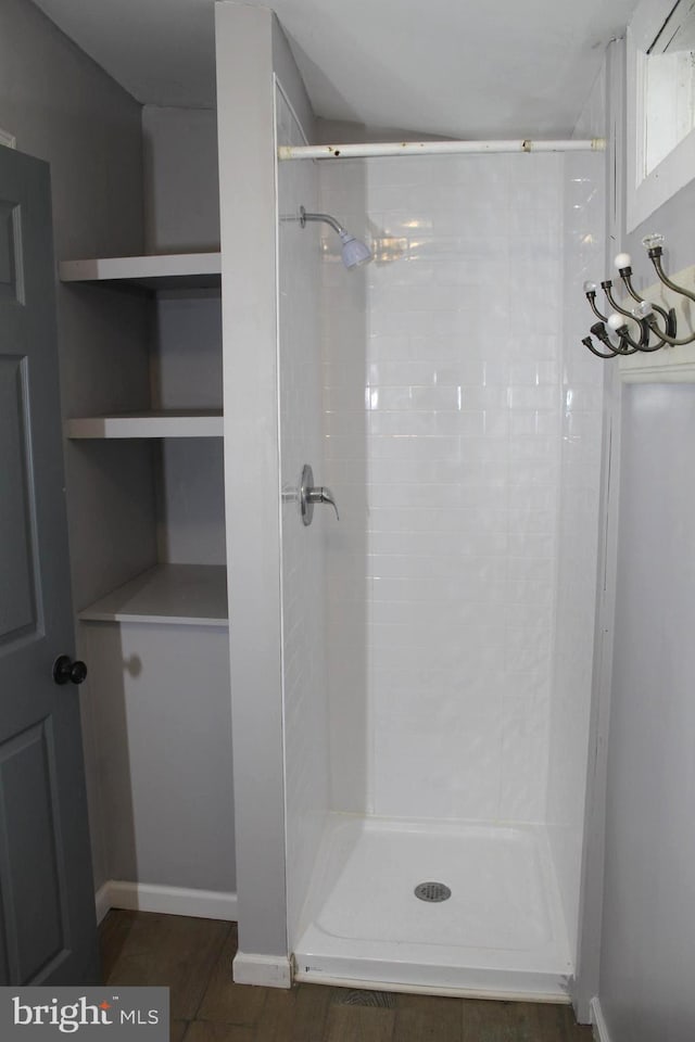 466 N Evans St, Pottstown, PA 19464 - full bathroom with wood finished floors, a shower stall, and baseboards