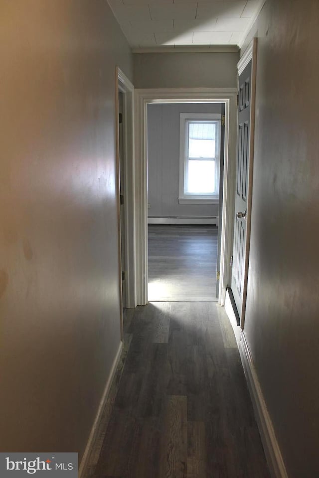 466 N Evans St, Pottstown, PA 19464 - hall featuring a baseboard heating unit, wood finished floors, and baseboards