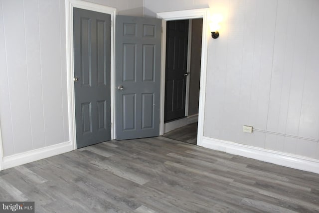 466 N Evans St, Pottstown, PA 19464 - unfurnished bedroom with baseboards and wood finished floors