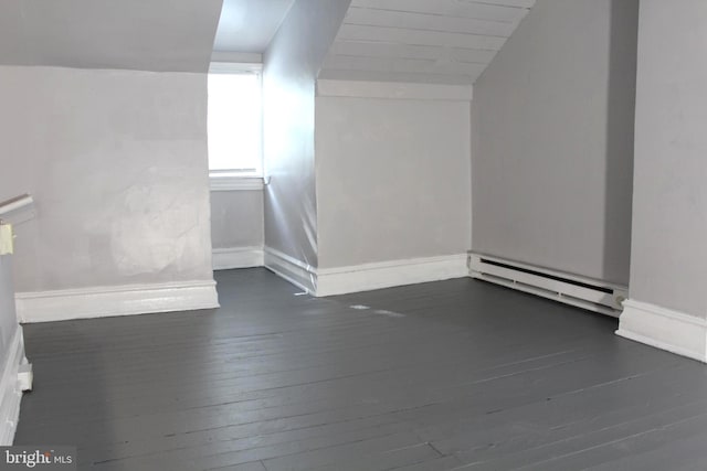 466 N Evans St, Pottstown, PA 19464 - additional living space featuring lofted ceiling, a baseboard radiator, dark wood-type flooring, and baseboards