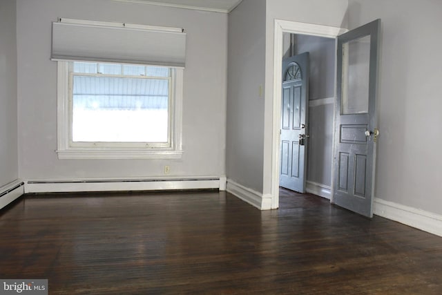 466 N Evans St, Pottstown, PA 19464 - empty room featuring baseboard heating, wood finished floors, and baseboards