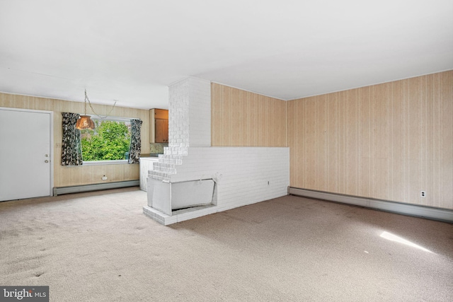 unfurnished living room with carpet flooring and baseboard heating