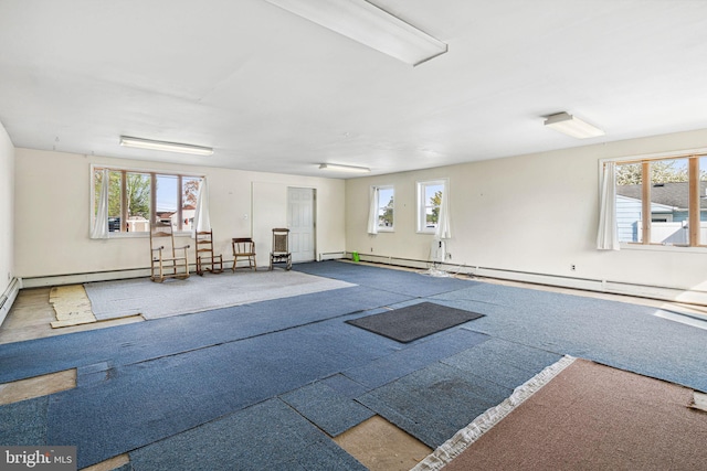 interior space featuring a baseboard heating unit