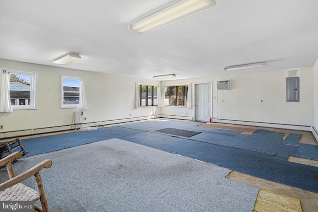 view of swimming pool with a wall unit AC and electric panel
