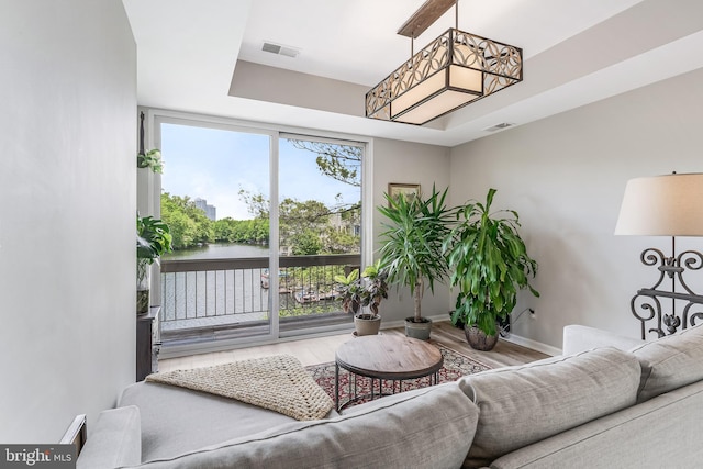 living room featuring wood finished floors and baseboards