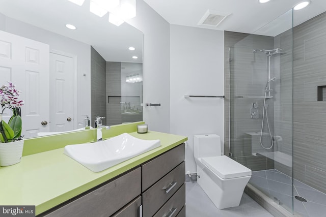 full bathroom with a stall shower, recessed lighting, vanity, toilet, and tile patterned floors