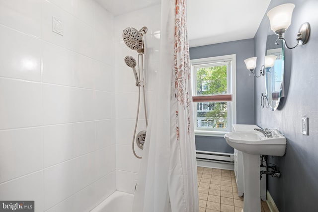 full bath with tile patterned floors, shower / bathtub combination with curtain, and a baseboard radiator
