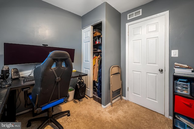 carpeted home office featuring visible vents