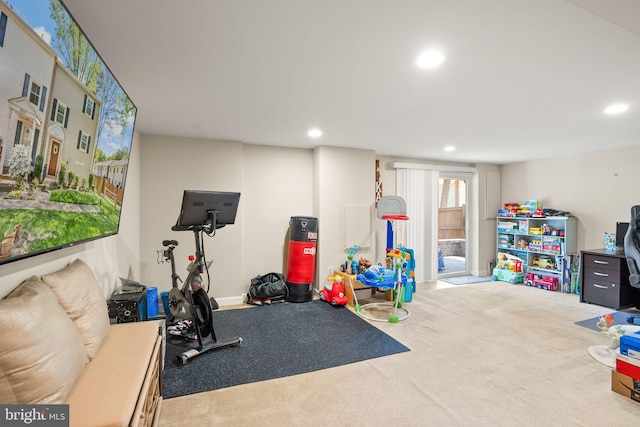 workout area featuring carpet flooring and recessed lighting