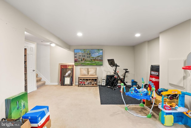 recreation room with carpet flooring and recessed lighting