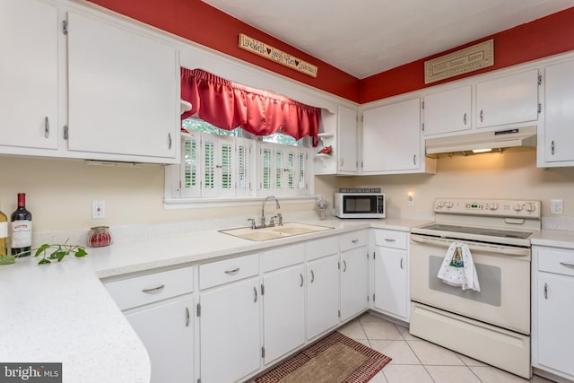 1085 Greenwood Rd, Winchester, VA 22602 - kitchen with white appliances, a sink, under cabinet range hood, and white cabinetry