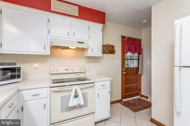 1085 Greenwood Rd, Winchester, VA 22602 - kitchen featuring white appliances, under cabinet range hood, light countertops, white cabinets, and light tile patterned floors