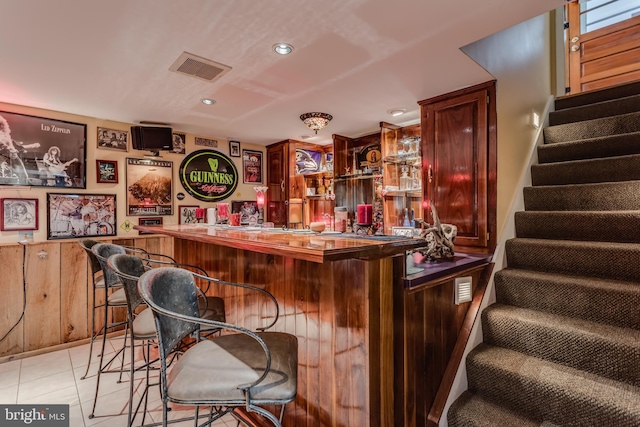 1085 Greenwood Rd, Winchester, VA 22602 - indoor wet bar with stairway, recessed lighting, and light tile patterned floors