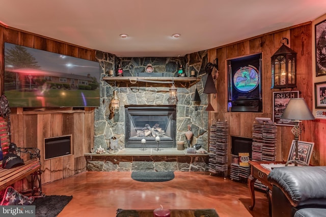 1085 Greenwood Rd, Winchester, VA 22602 - living room featuring a fireplace and wooden walls