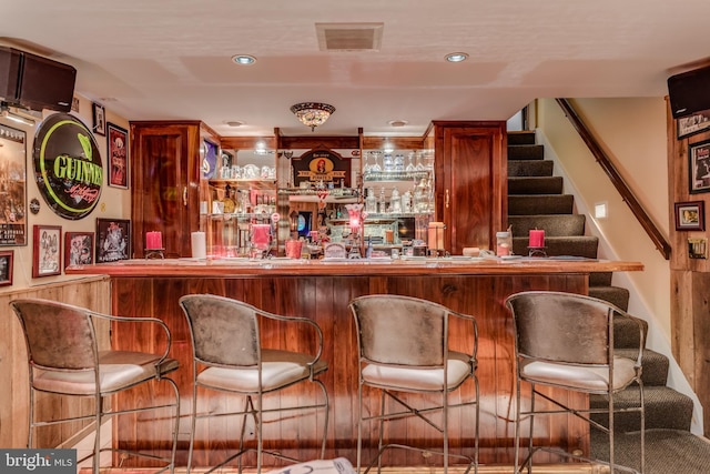 1085 Greenwood Rd, Winchester, VA 22602 - indoor wet bar featuring stairs and recessed lighting