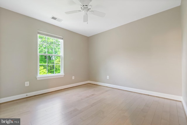 6725 Accipiter Dr, New Market, MD 21774 - empty room featuring light wood finished floors, visible vents, baseboards, and a ceiling fan