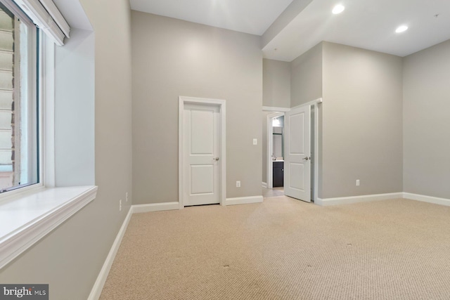 6725 Accipiter Dr, New Market, MD 21774 - unfurnished bedroom with light carpet, baseboards, and recessed lighting