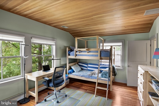 bedroom featuring wood ceiling, visible vents, wood finished floors, a baseboard heating unit, and lofted ceiling