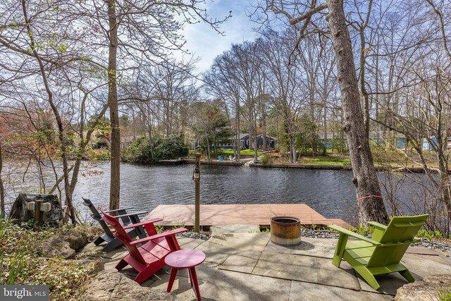 view of dock with a water view