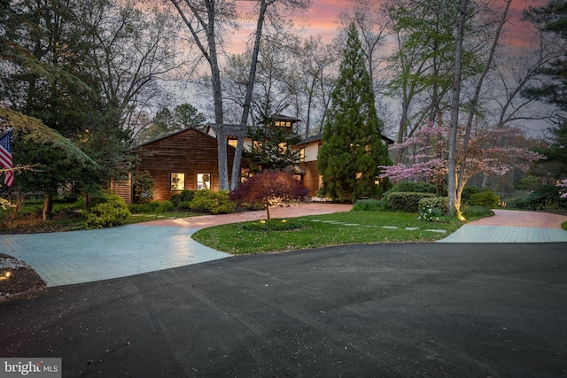 exterior space with a front lawn