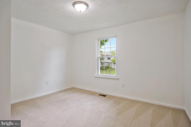 1603 Norwich Dr, Frederick, MD 21701 - unfurnished room featuring carpet, baseboards, and a textured ceiling