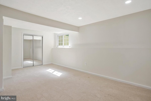 1603 Norwich Dr, Frederick, MD 21701 - unfurnished bedroom with light colored carpet, baseboards, a closet, and recessed lighting