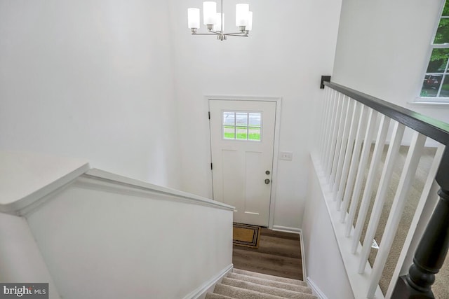 1603 Norwich Dr, Frederick, MD 21701 - stairway with wood finished floors and a chandelier