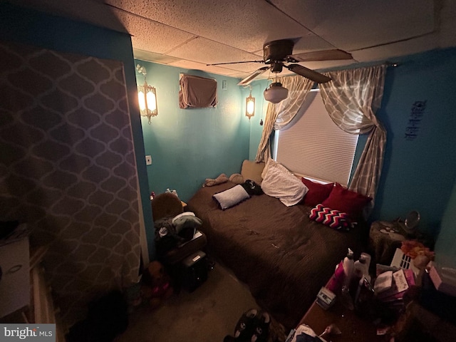 bedroom featuring a drop ceiling