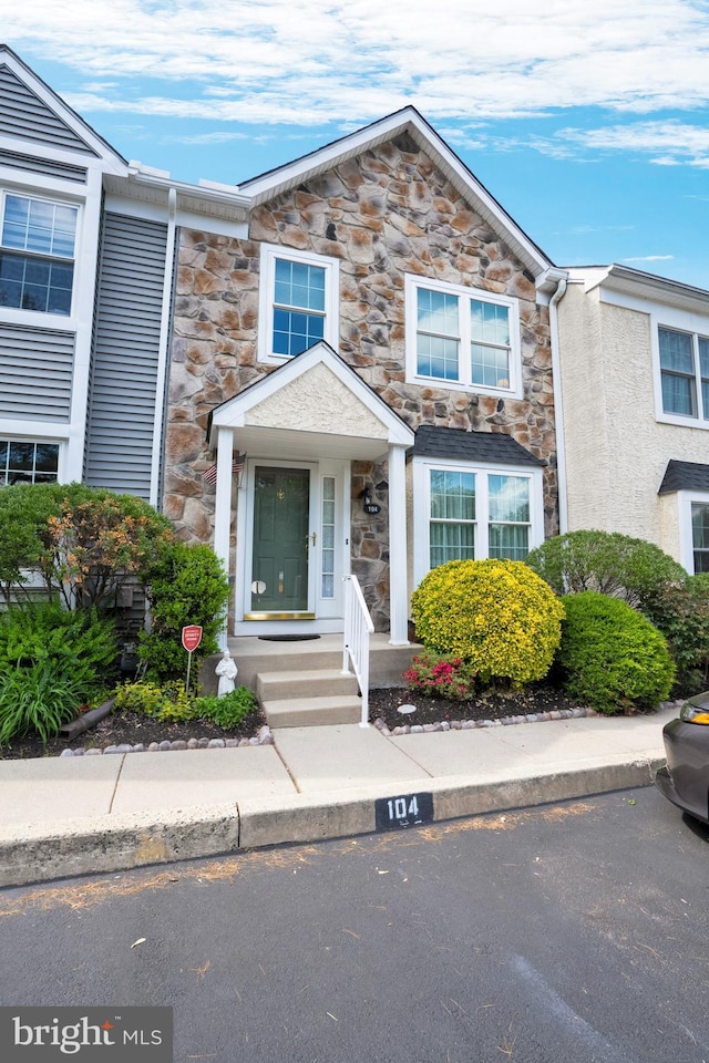 multi unit property with stone siding