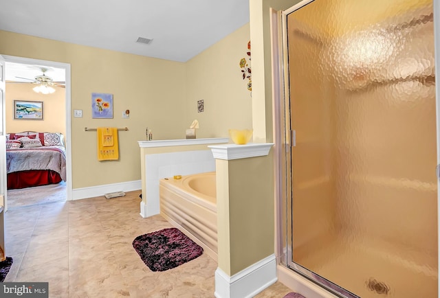 bathroom featuring a ceiling fan, a shower stall, a bath, and ensuite bathroom