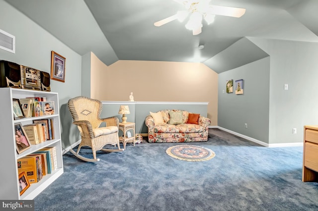 sitting room featuring lofted ceiling, a ceiling fan, carpet floors, and baseboards