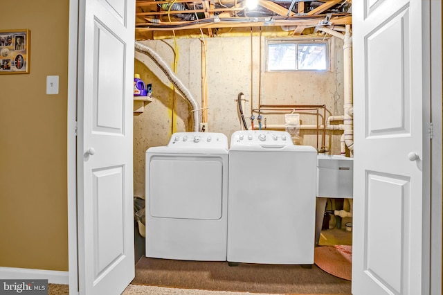 laundry room featuring separate washer and dryer