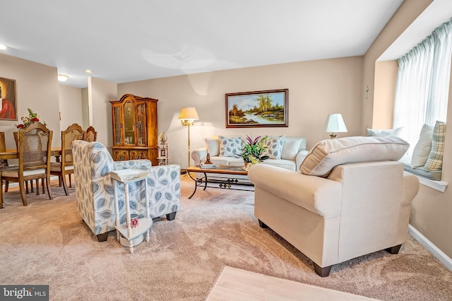 living room featuring carpet, recessed lighting, and baseboards