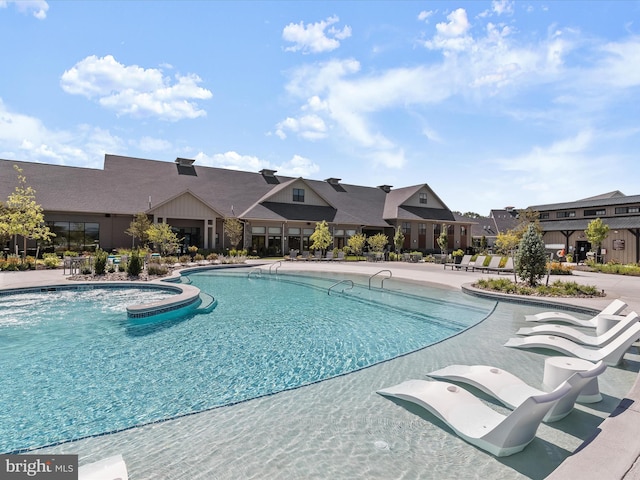 community pool featuring a residential view