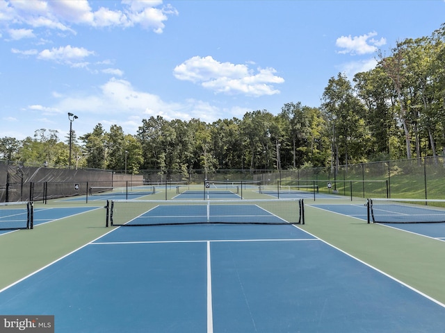 view of sport court with community basketball court and fence