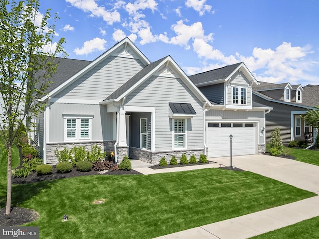 craftsman inspired home with a front lawn, stone siding, a shingled roof, board and batten siding, and concrete driveway