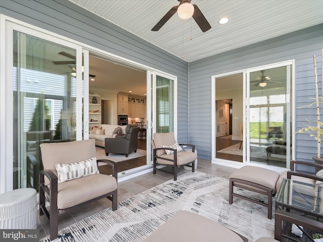 view of patio / terrace with ceiling fan and an outdoor hangout area