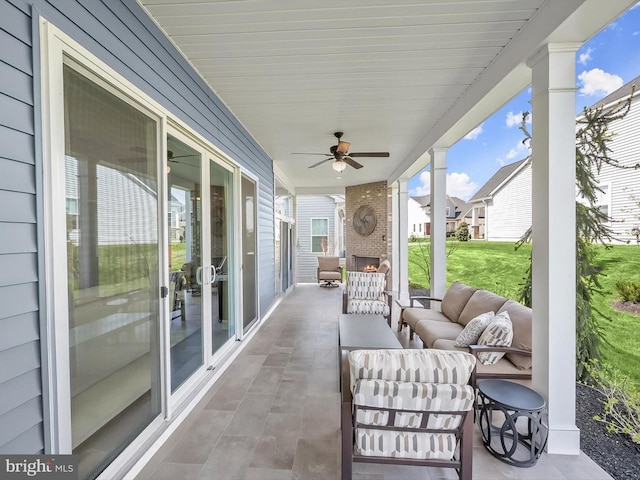 view of patio featuring ceiling fan and outdoor lounge area