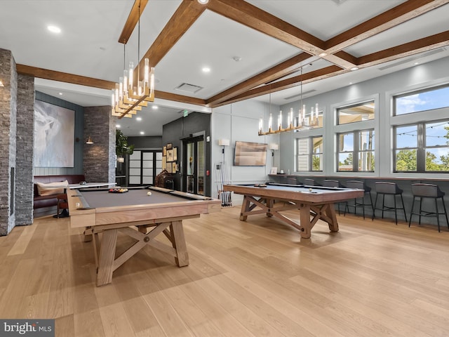 recreation room featuring pool table, a healthy amount of sunlight, and beam ceiling