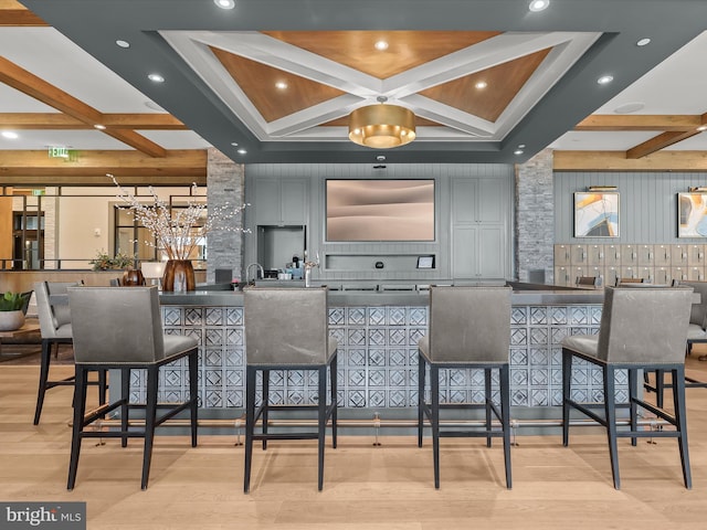 bar featuring beam ceiling, coffered ceiling, recessed lighting, and wood finished floors