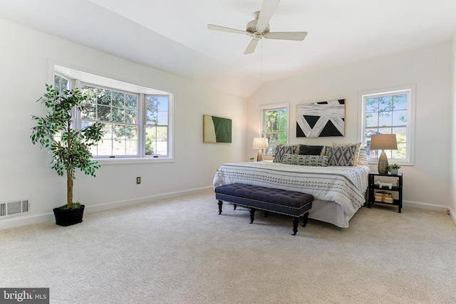 bedroom featuring visible vents, carpet flooring, baseboards, and multiple windows