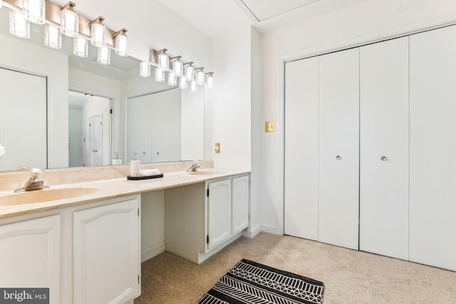 full bathroom with double vanity, a sink, and carpet