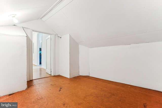 bonus room featuring lofted ceiling