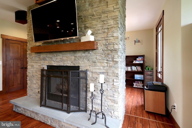 441 Millgate Rd, Bellefonte, PA 16823 - detailed view of wood finished floors, a fireplace, and baseboards