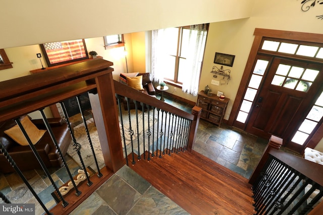 441 Millgate Rd, Bellefonte, PA 16823 - entryway with stone tile flooring, baseboards, and stairway