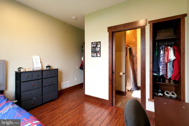 441 Millgate Rd, Bellefonte, PA 16823 - bedroom featuring hardwood / wood-style flooring, baseboards, and a closet
