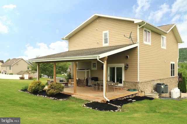 441 Millgate Rd, Bellefonte, PA 16823 - back of property with a deck, a yard, and central AC unit